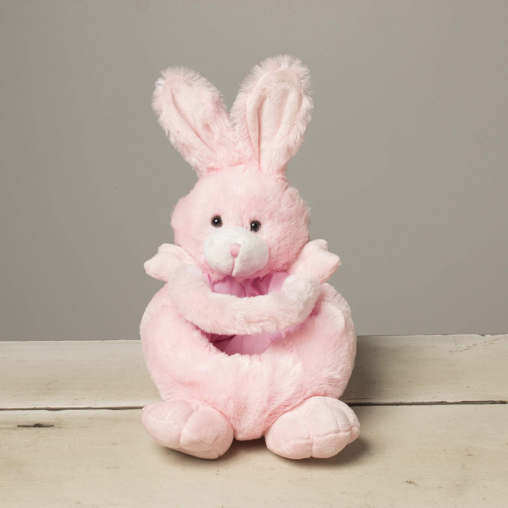 small pink plush basket shaped like an easter bunny