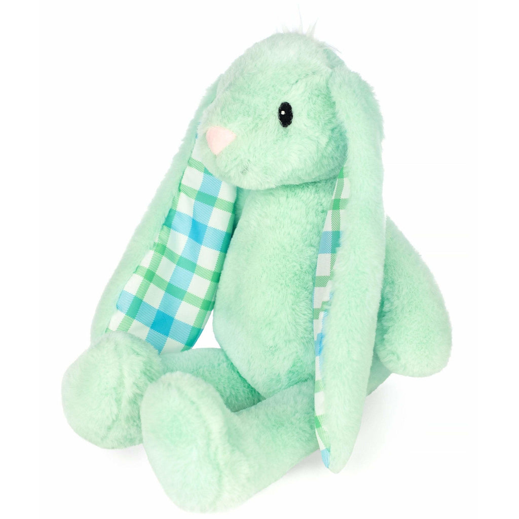 green stuffed animal bunny facing left