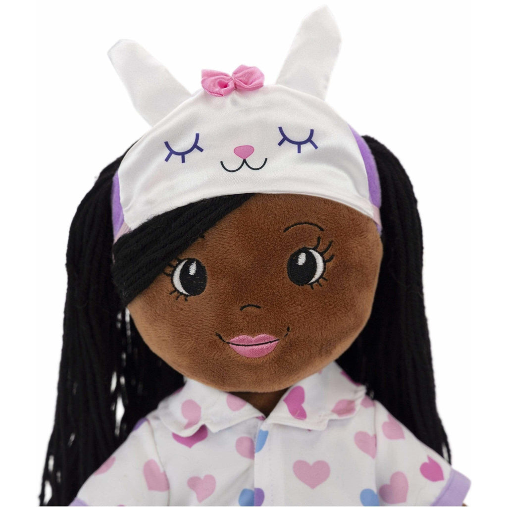 face of rag doll wearing pajama hat